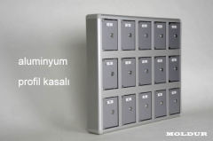 Aluminum-cased locker with 15-unit capacity and nameplate.