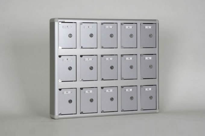 Aluminum-cased locker with 15-unit capacity and nameplate.