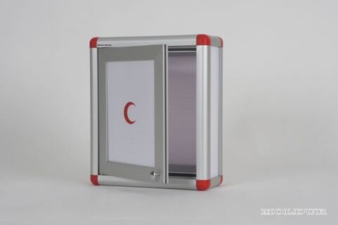 Medicine cabinet with magnetic door and handle.