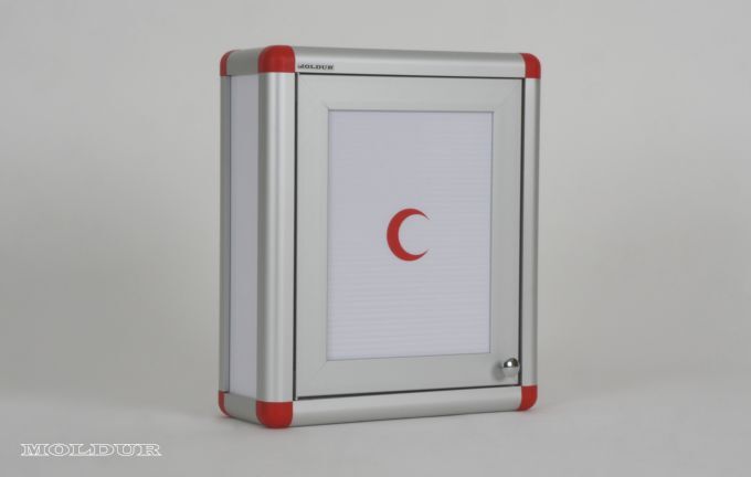 Medicine cabinet with magnetic door and handle.