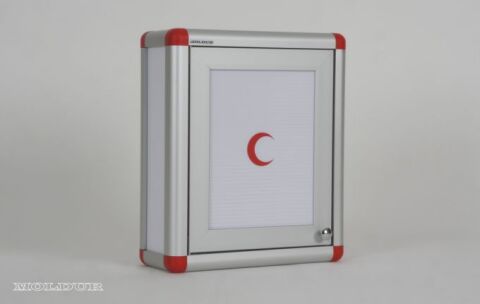 Medicine cabinet with magnetic door and handle.