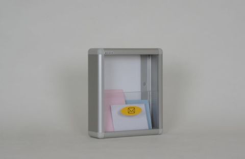 Mailbox without door, fixed with plexiglass barrier.